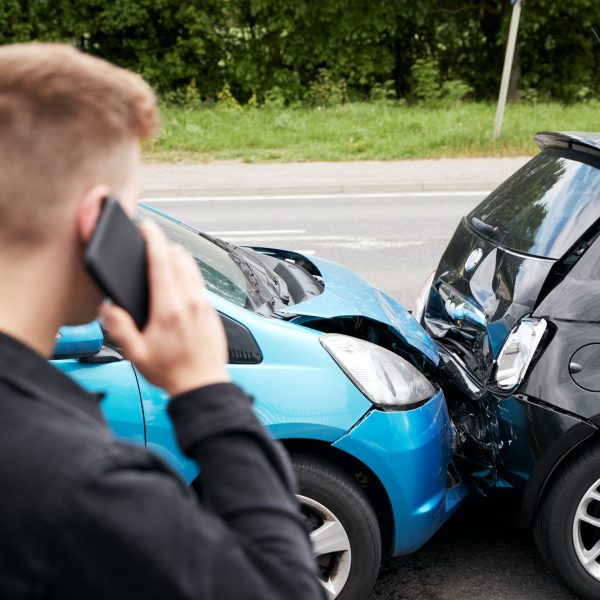 young-male-motorist-involved-in-car-accident-calling-insurance-company-or-recovery-service.jpg young-male-motorist-involved-in-car-accident-calling-insurance-company-or-recovery-service.jpg